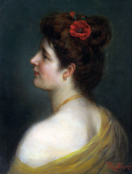 Junge Frau mit Klatschmohnbluten im Haar